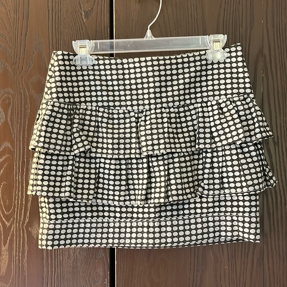 Arden B. Dark gray with light gray polka dots, mini skirt. Size 6.